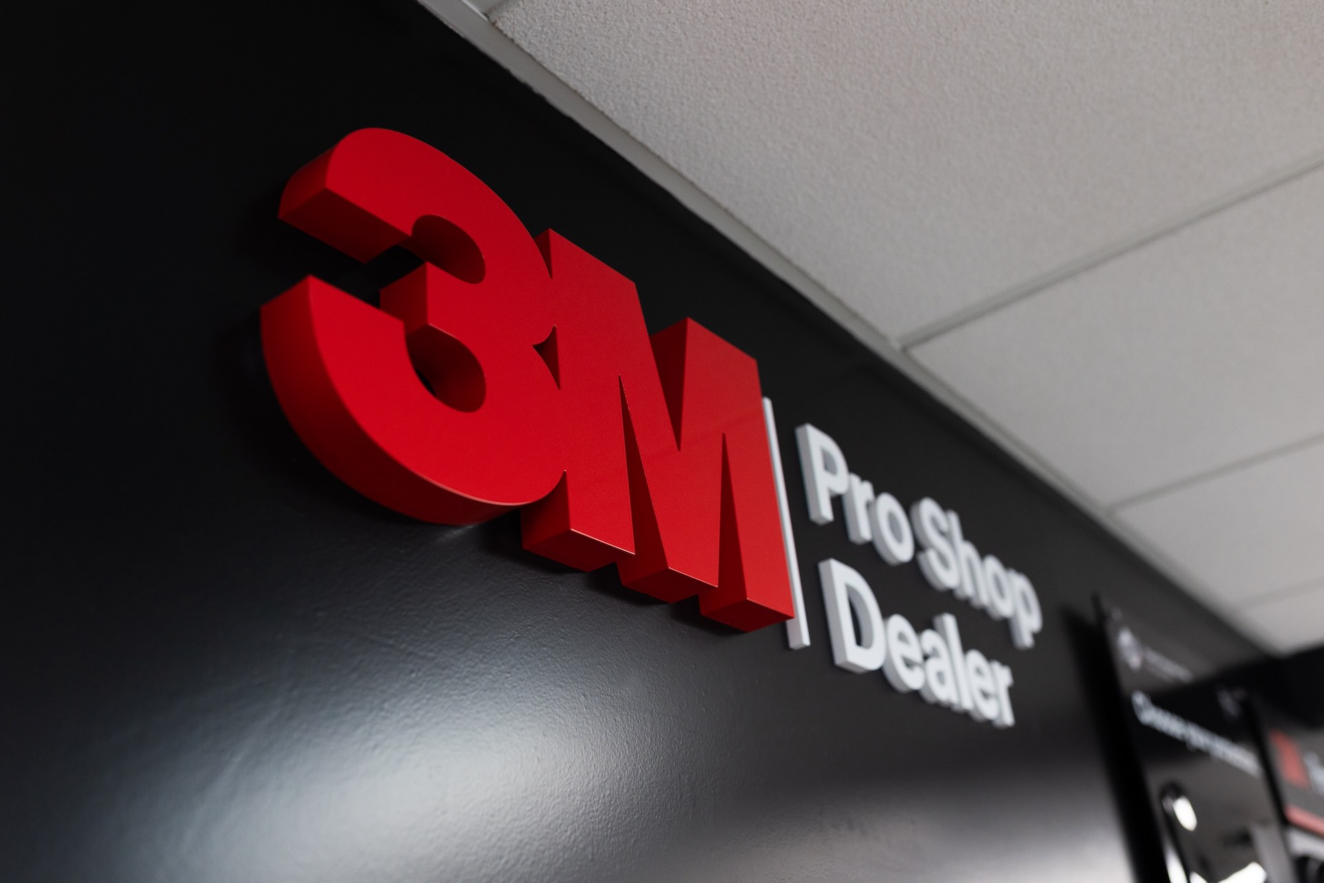 acrylic 3M Pro Shop Dealer sign installed on interior wall